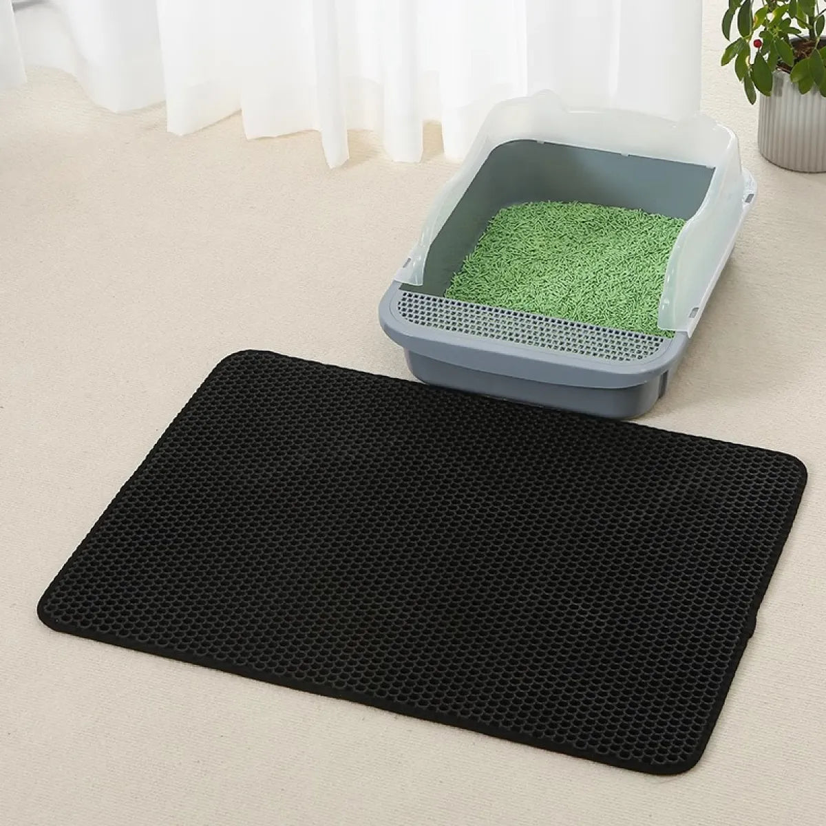 Alfombrilla para cajón de gatos